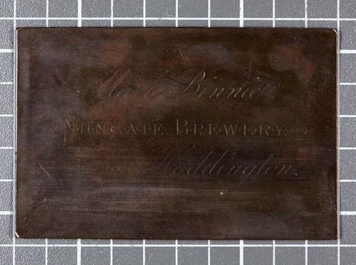 A printing block for Mark Binnie & Co's business cards